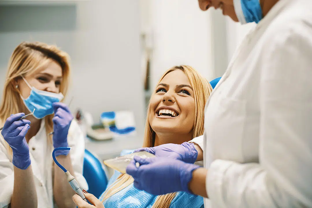 Dental patient smiling at dental appointment