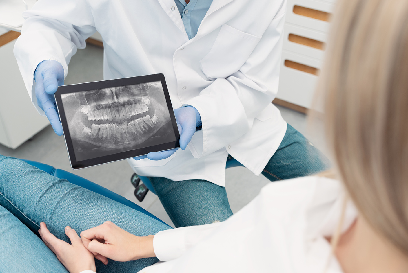 dr cox showing patient a dental xray at cox family dentistry